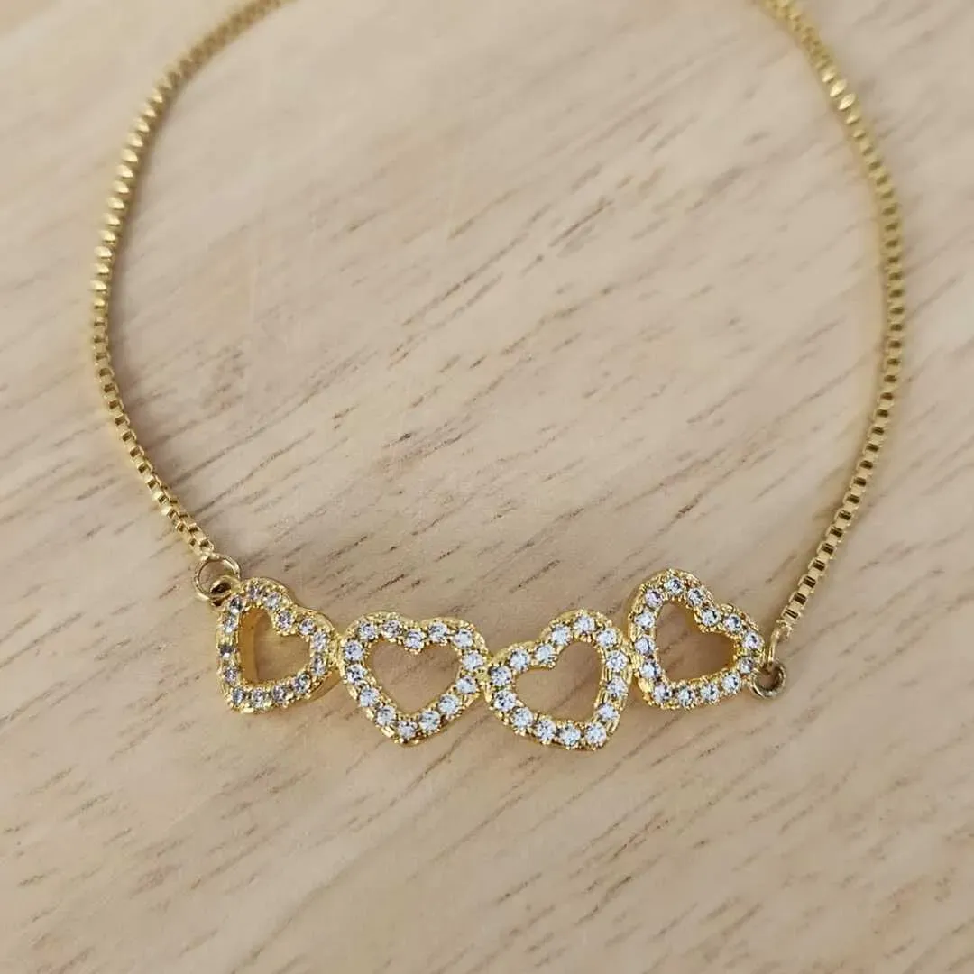 PULSEIRA DOURADA SHAMBALA CORAÇÕES CRAVEJADOS MICROZIRCÔNIAS CRISTAL