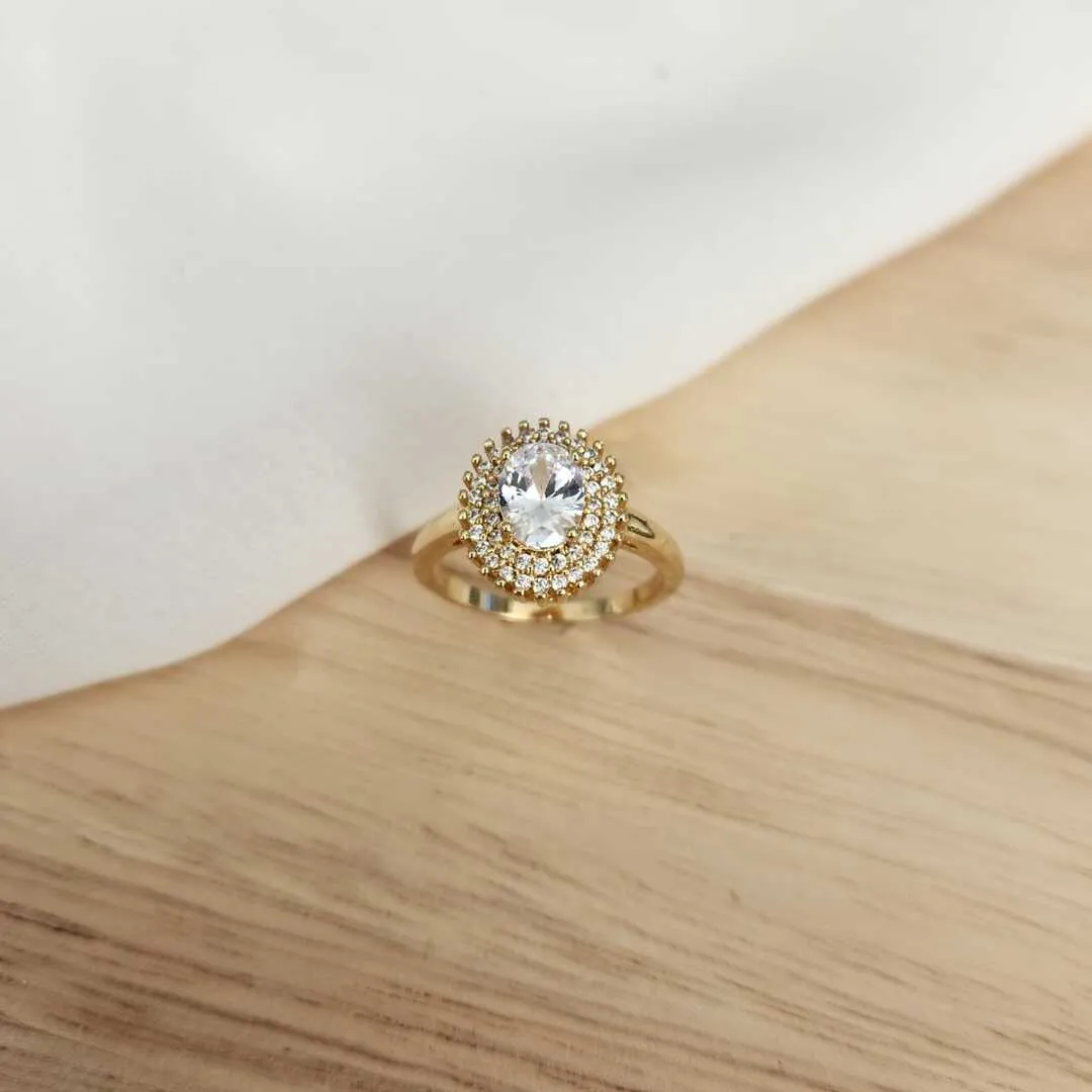 ANEL DOURADO PEDRA OVAL CRISTAL CRAVEJADO MICROZIRCÔNIAS