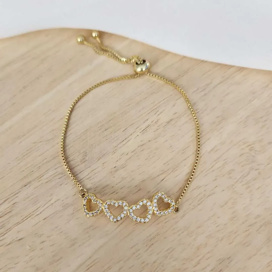 PULSEIRA DOURADA SHAMBALA CORAÇÕES CRAVEJADOS MICROZIRCÔNIAS CRISTAL