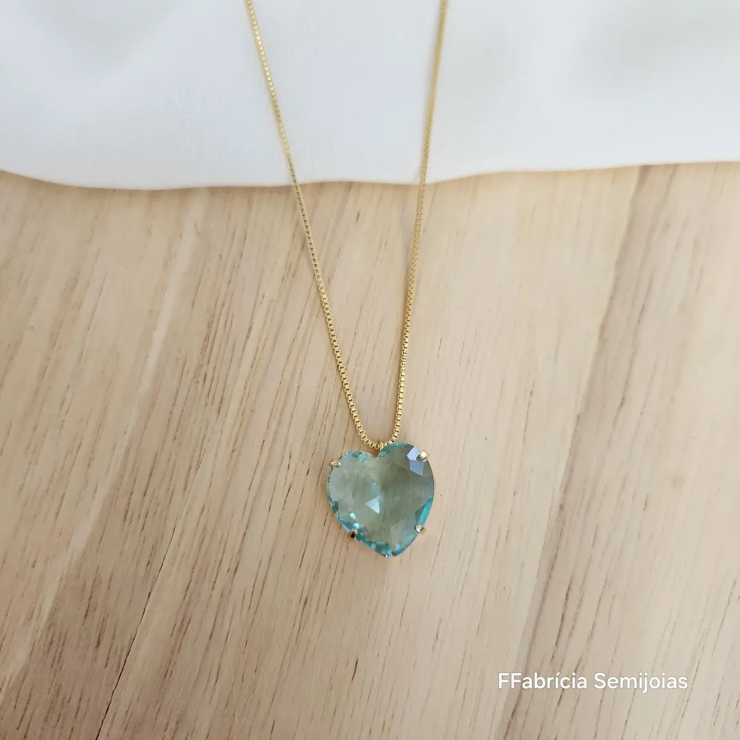 COLAR CORAÇÃO DOURADO PEDRA AZUL CLARO
