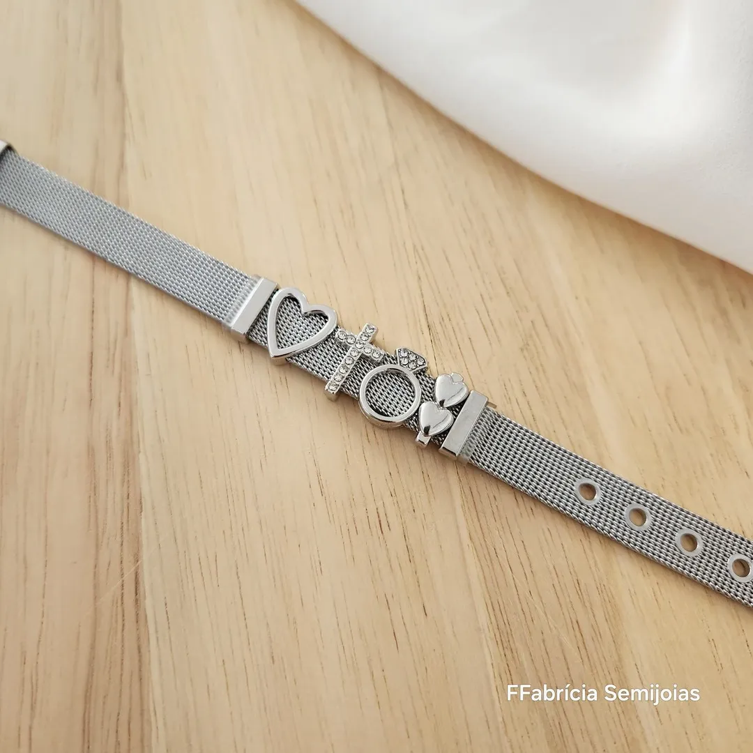 PULSEIRA AÇO AJUSTÁVEL COM CHARMS CORAÇÃO/CRUZ/ANELCORAÇÕES