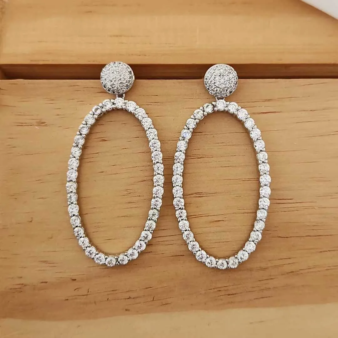BRINCO FESTA RÓDIO BRANCO OVAL ZIRCÔNIAS CRISTAL