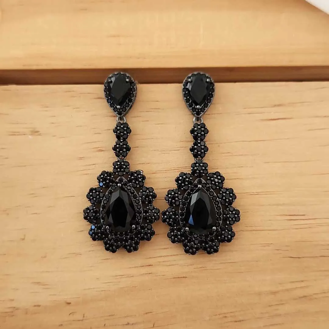 BRINCO FESTA RÓDIO NEGRO ZIRCÔNIA NEGRA CRAVEJADO