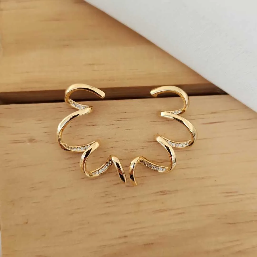 BRINCO ESPIRAL CRAVEJADO EM MICROZIRCÔNIAS CRISTAL