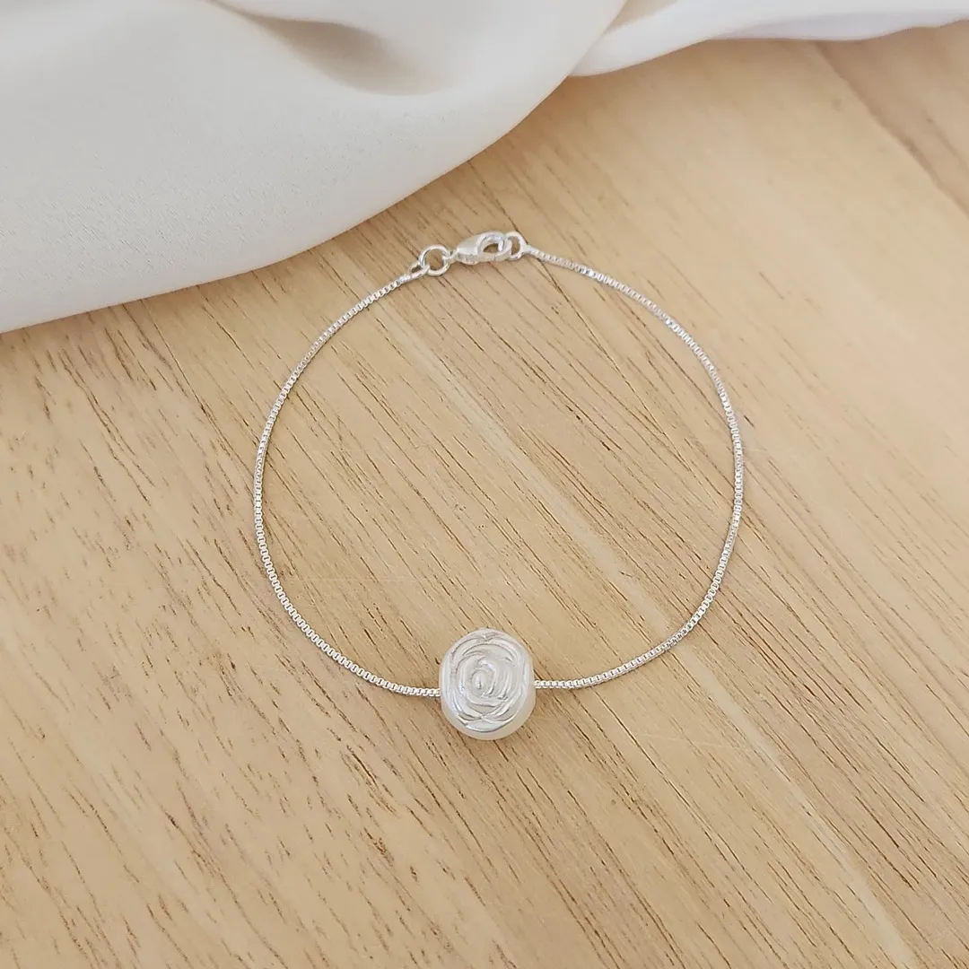 PULSEIRA VENEZIANA PINGENTE FORMATO ROSA MADREPÉROLA SINTÉTICA