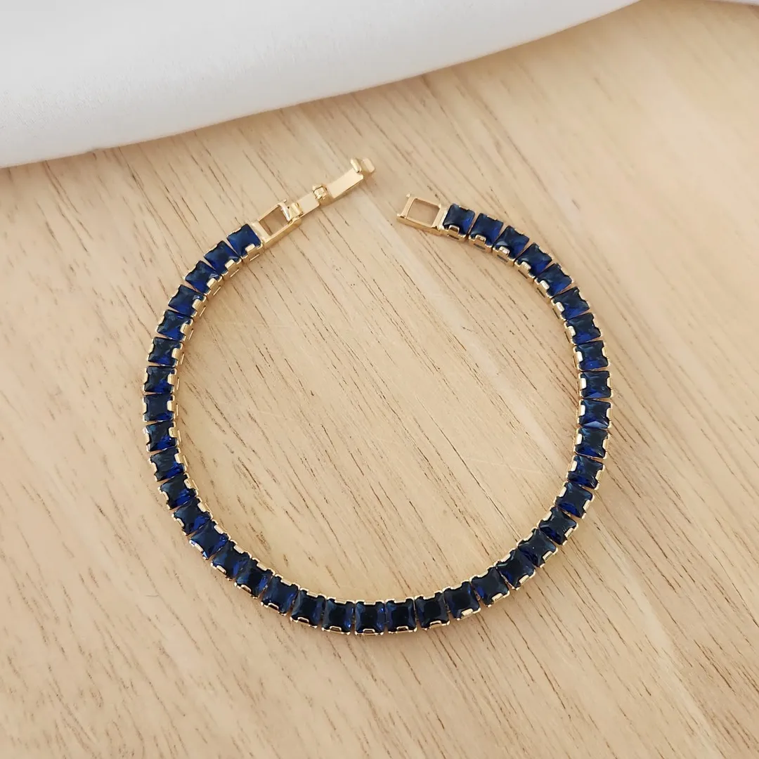 PULSEIRA DOURADA NAVETES QUADRADAS AZUL