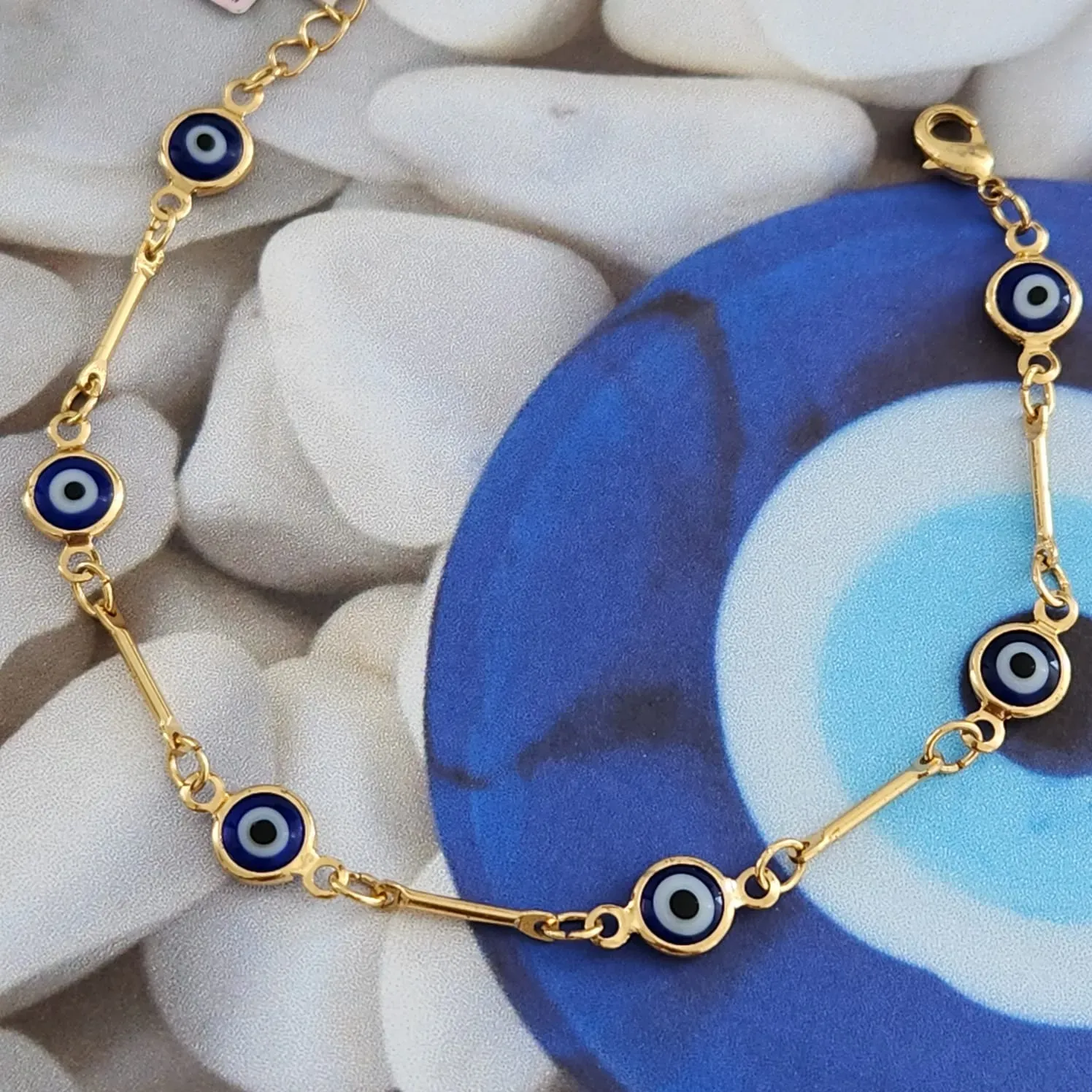 PULSEIRA DOURADA PEÇAS E OLHO GREGO