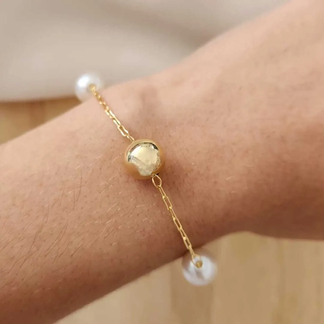 PULSEIRA COM DUAS PÉROLAS E DUAS BOLAS 10MM