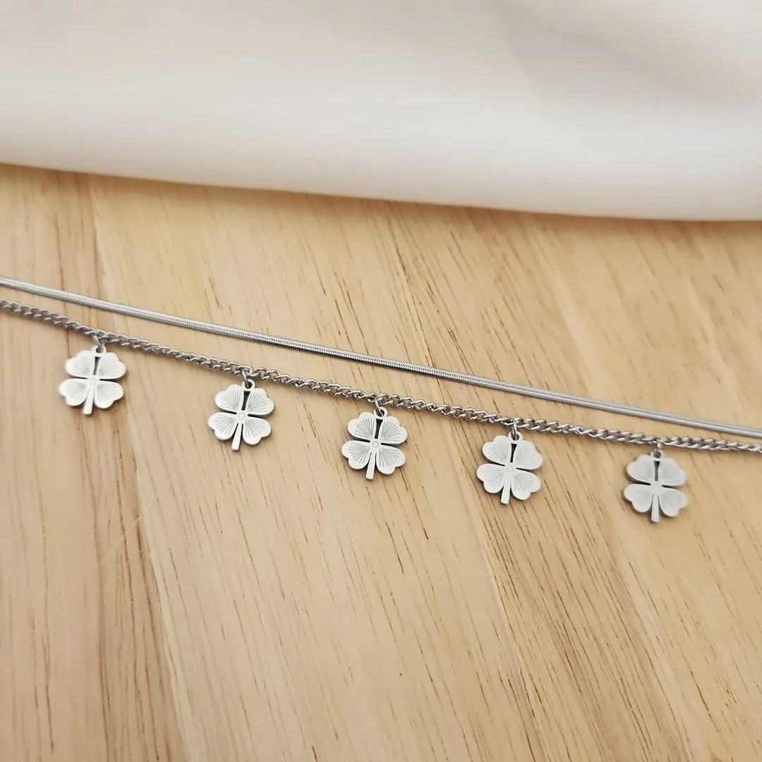 PULSEIRA AÇO DOIS FIOS TREVOS DE QUATRO FOLHAS