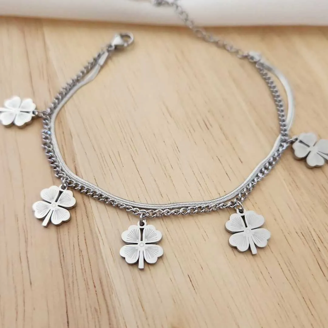 PULSEIRA AÇO DOIS FIOS TREVOS DE QUATRO FOLHAS