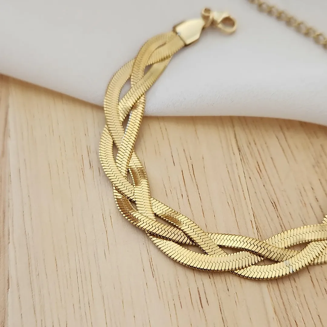 PULSEIRA AÇO DOURADO MALHA FITA MÉDIA TRÊS FIOS TRANÇADOS