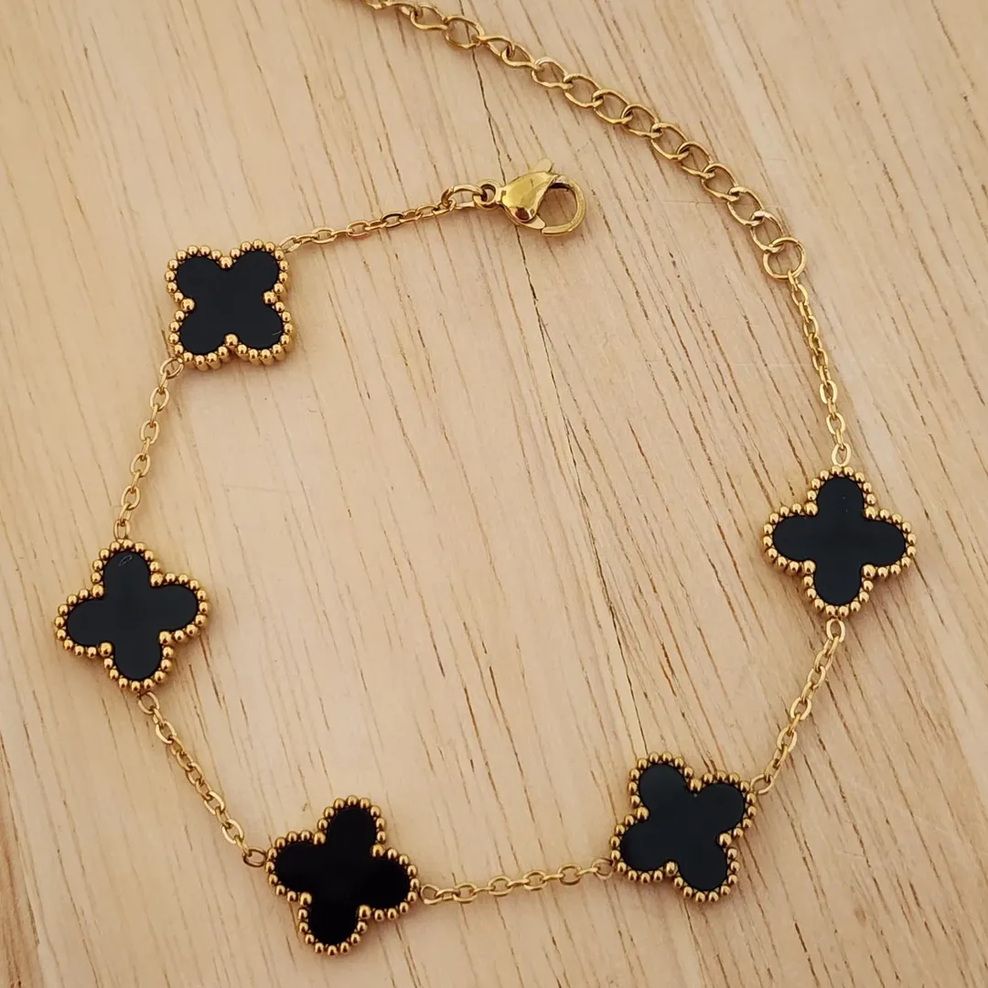 PULSEIRA AÇO DOURADA CINCO TREVOS PRETO G