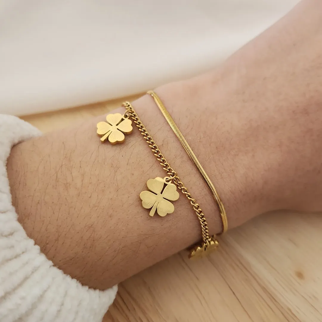 PULSEIRA AÇO DOURADA DOIS FIOS TREVOS DE QUATRO FOLHAS