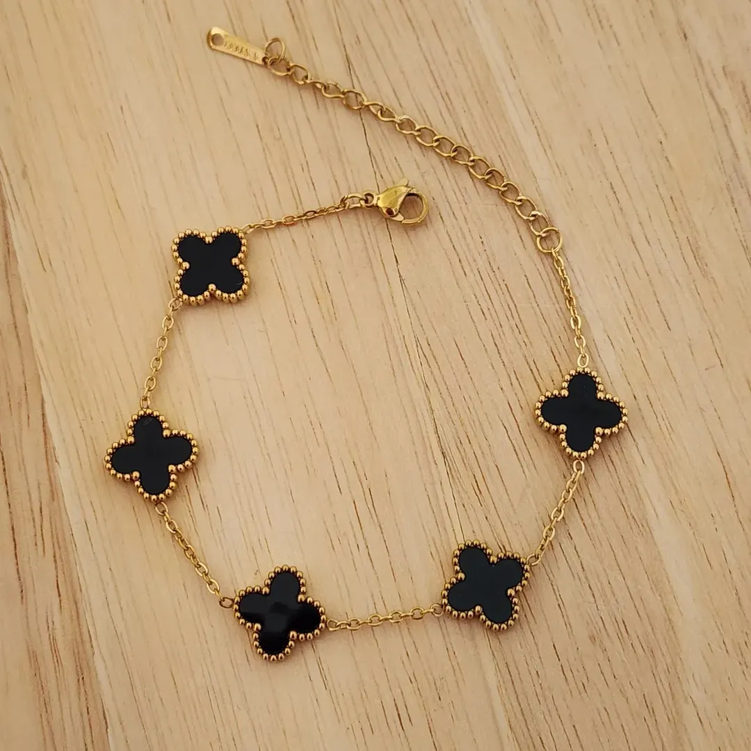 PULSEIRA AÇO DOURADA CINCO TREVOS PRETO G