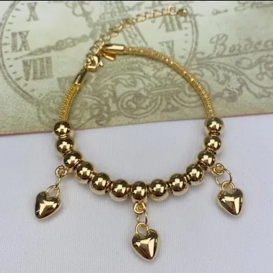 PULSEIRA DOURADA BOLINHA PINGENTE CORAÇÃO