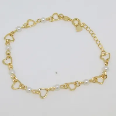 PULSEIRA DOURADA CORAÇÃO VAZADO E PÉROLA