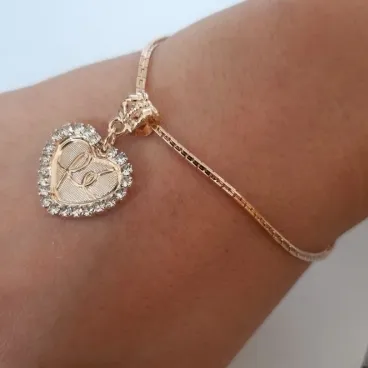 PULSEIRA DOURADA PINGENTE CORAÇÃO FÉ CRAVEJADO COM ZIRCÔNIAS CRISTAL