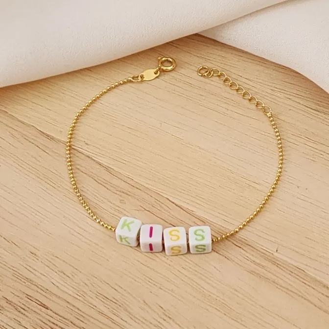 PULSEIRA BOLINHAS COM LETRAS LEITOSAS KISS