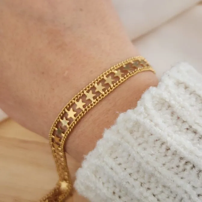 PULSEIRA DOURADA LARGA ESTRELAS