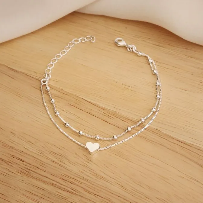 PULSEIRA DUAS EM UMA. BOLINHAS E VENEZIANA COM PINGENTE DE CORAÇÃO