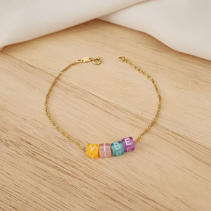 PULSEIRA SINGAPURA COM LETRAS COLORIDAS VIBE