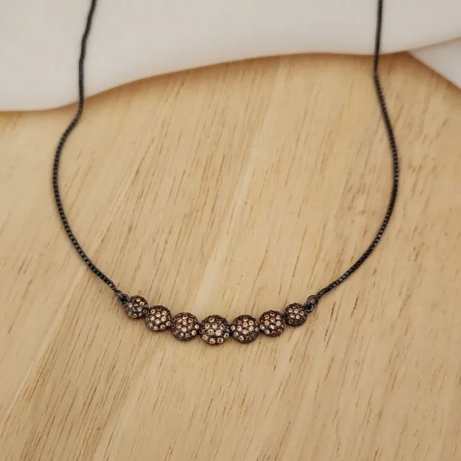 COLAR RÓDIO NEGRO BOLAS CRAVEJADO CITRINO