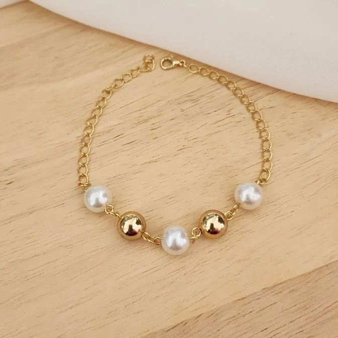 PULSEIRA DOURADA BOLAS E PÉROLAS