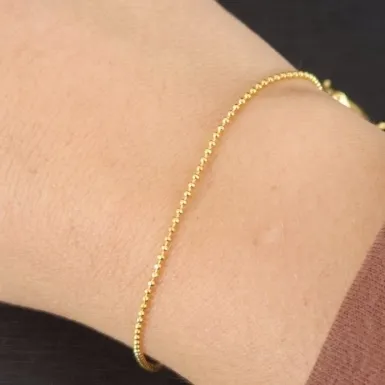 PULSEIRA DOURADA BOLINHAS