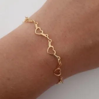PULSEIRA DOURADA CORAÇÃO VAZADO