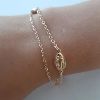 PULSEIRA DOURADA DOIS FIOS BÚZIOS