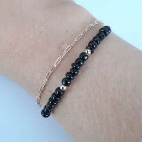 PULSEIRA DOURADA FIO DUPLO COM MIÇANGAS NEGRAS